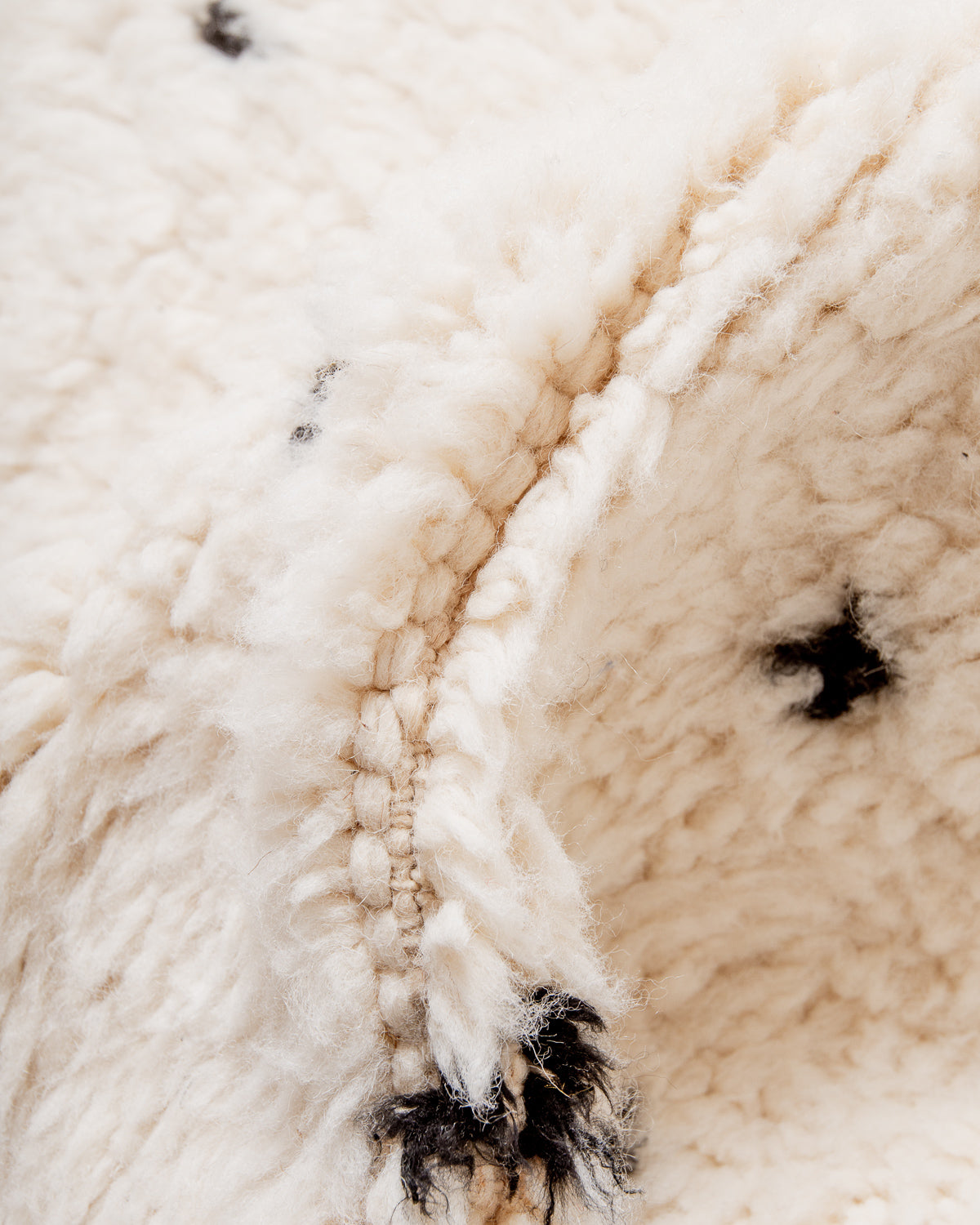 Modern, designer, handcrafted Berber rug from Morocco. Beniourain carpet with beautiful colours and patterns and fluffy wool texture.